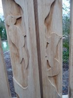 Carved animals on Wildlife Enclosure gates by Jennie kettlewell